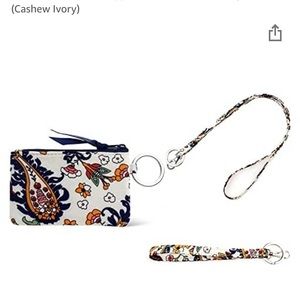 Small zipper wallet with wrist and lanyard